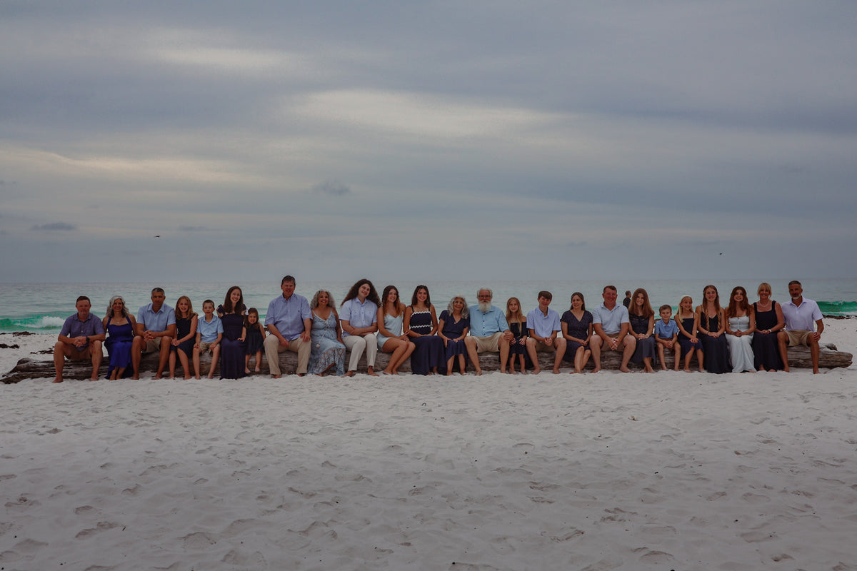 Large extended family group on the beach