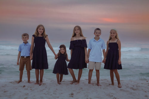 Family on the beach at sunset in 30A